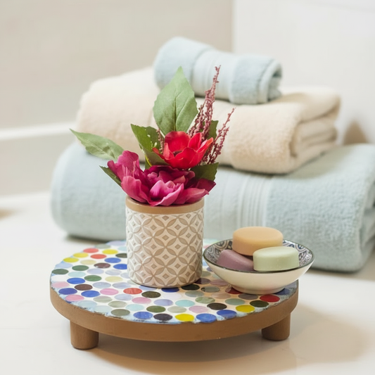 Colorful handcrafted polka dot rainbow mosaic plant stand by Miss Bette's Creations with vibrant, intricate tile design.