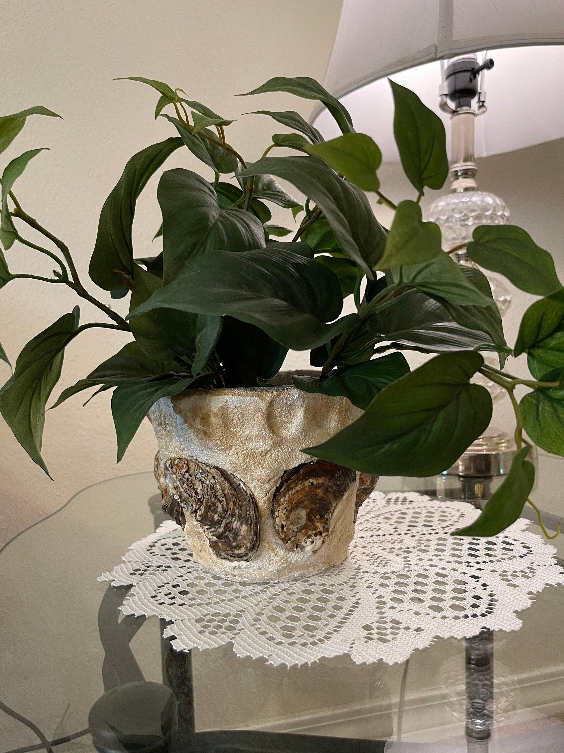 Handcrafted oyster shell relief planter with natural texture and design, showcasing intricate oyster shell details.
