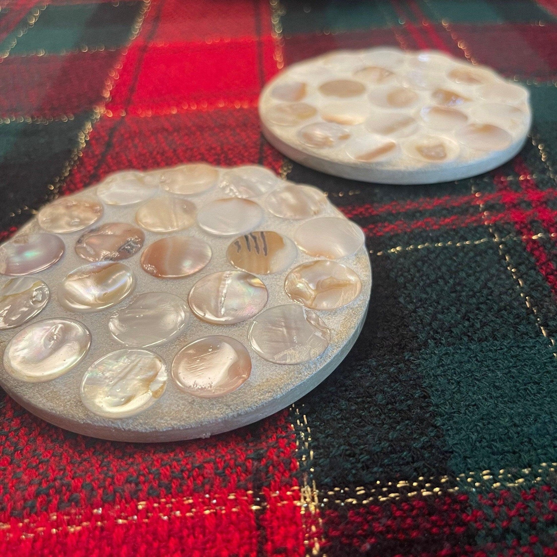 Mother of Pearl mosaic coaster set featuring elegant, iridescent coasters with intricate pearl patterns for home decor.