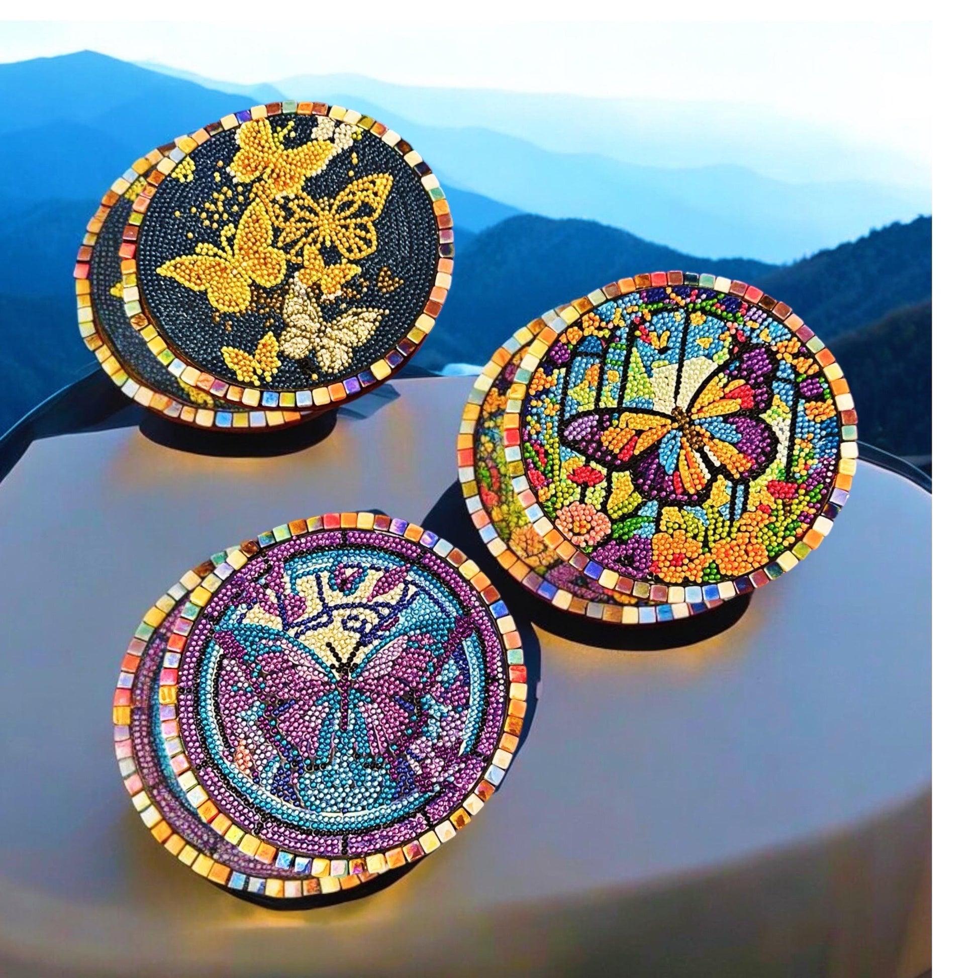 Butterfly crystal mosaic trivet with decorative display featuring colorful glass and intricate butterfly design.