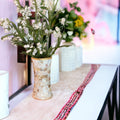 Elegant mother of pearl mosaic flower vase with floral design, featuring a glossy finish and intricate craftsmanship.