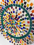 Colorful handcrafted rainbow tile decorative plate with vibrant mosaic design, perfect for wall decor or display.