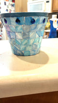 Artisan teal mosaic planter with mother of pearl accents from Miss Bette's Creations, showcasing intricate tile design and vibrant colors.