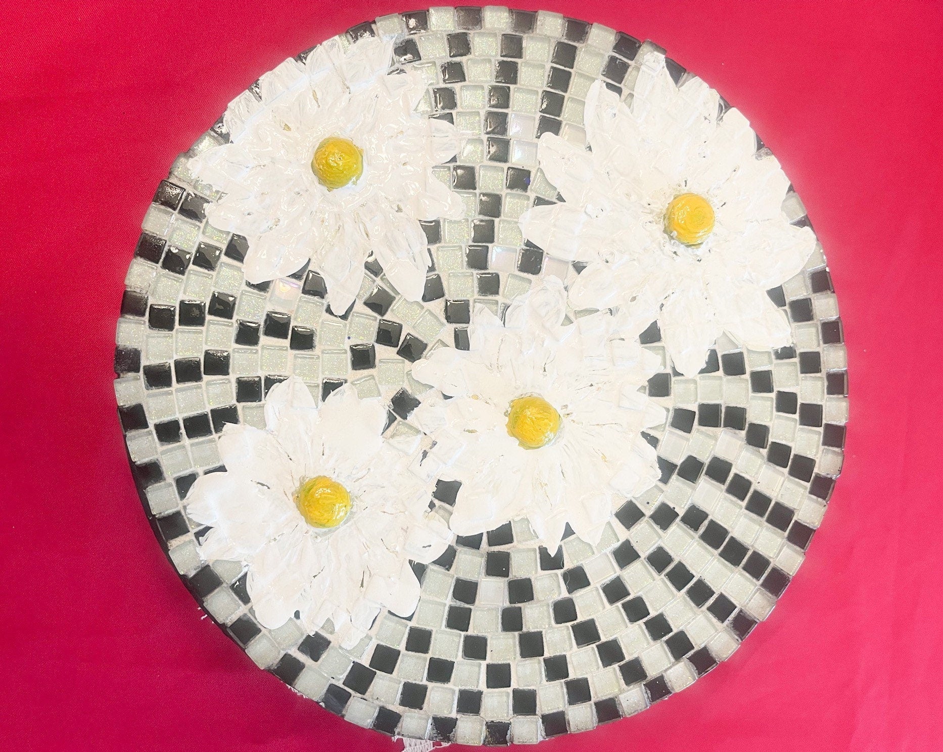 Daisy floral mosaic art cake plate with colorful floral design on ceramic surface, ideal for serving desserts.