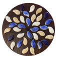 Handcrafted blue and white petal mosaic wooden plant stand with four legs, showcasing intricate tile design for indoor or outdoor use