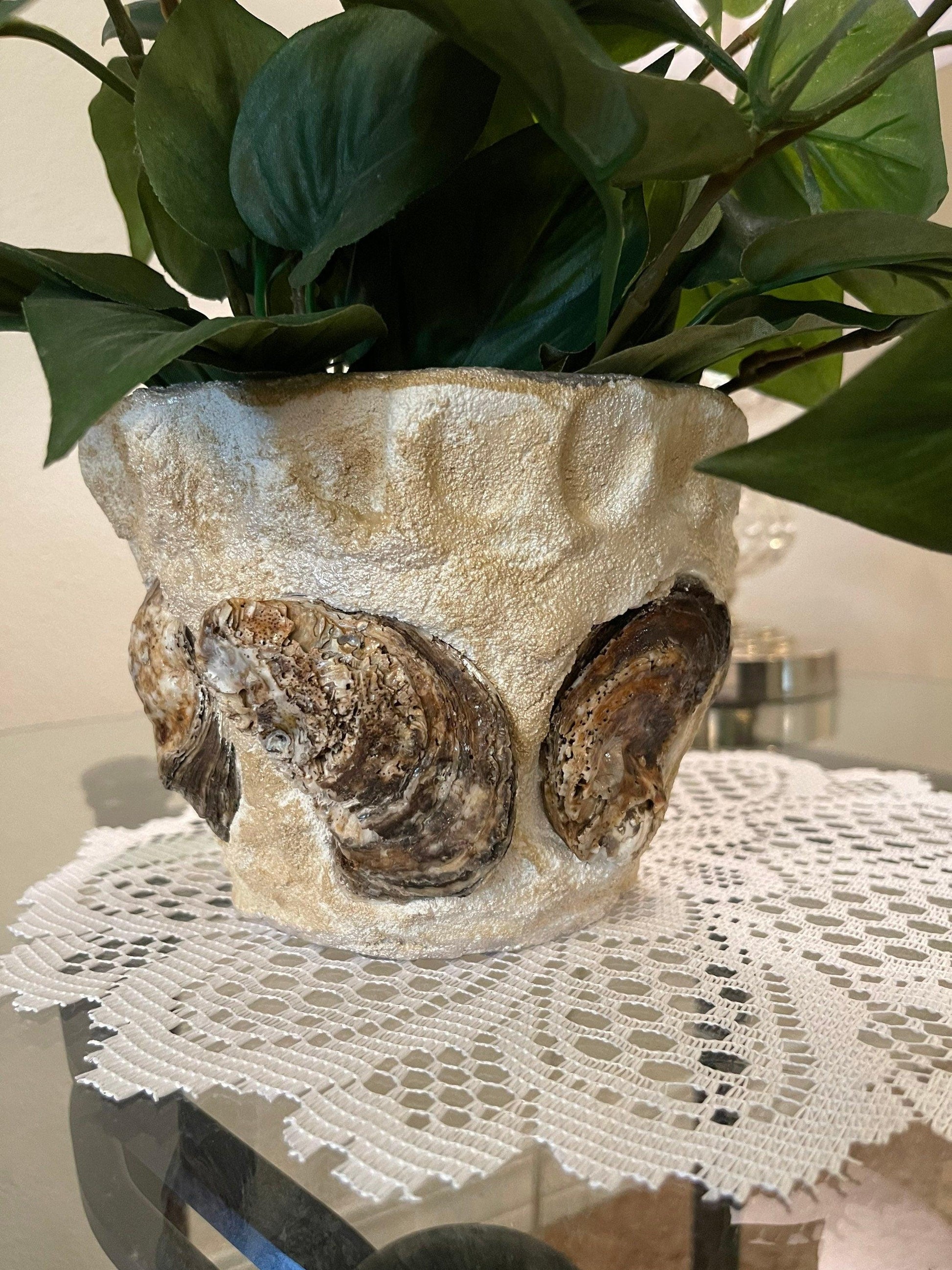 Handcrafted oyster shell relief planter with textured shell design, ideal for indoor or outdoor plant display