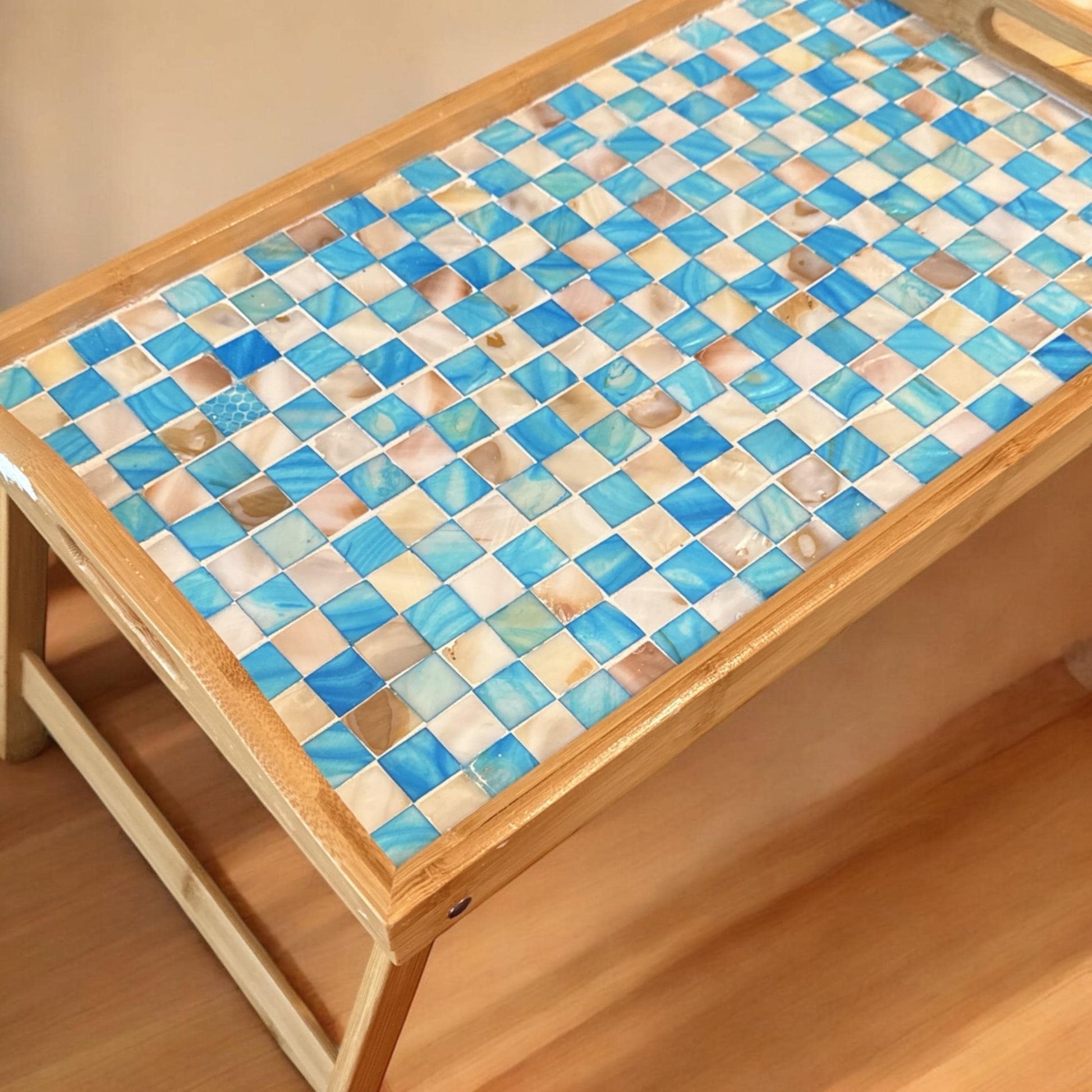 Luxury bamboo bed tray with mosaic inlay, featuring a natural wooden surface and elegant decorative mosaic detail.