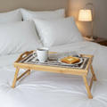 Rustic bamboo bed tray with stone mosaic inlay, wooden handles, perfect for breakfast or serving in a natural home decor style.