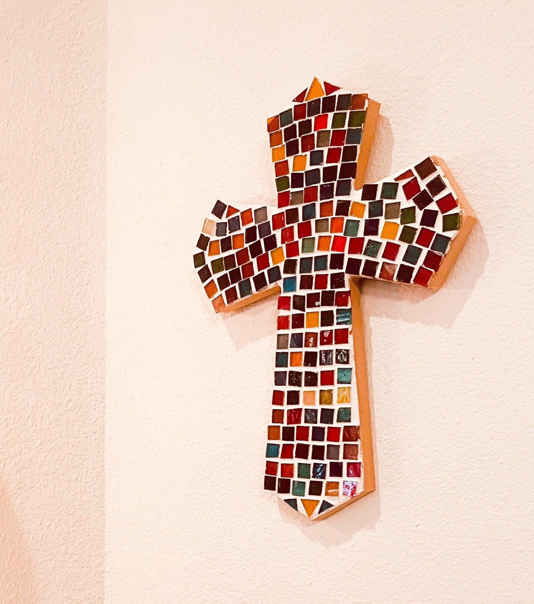 Handcrafted multicolor mosaic cross with intricate tile design, showcasing vibrant colors and detailed craftsmanship.