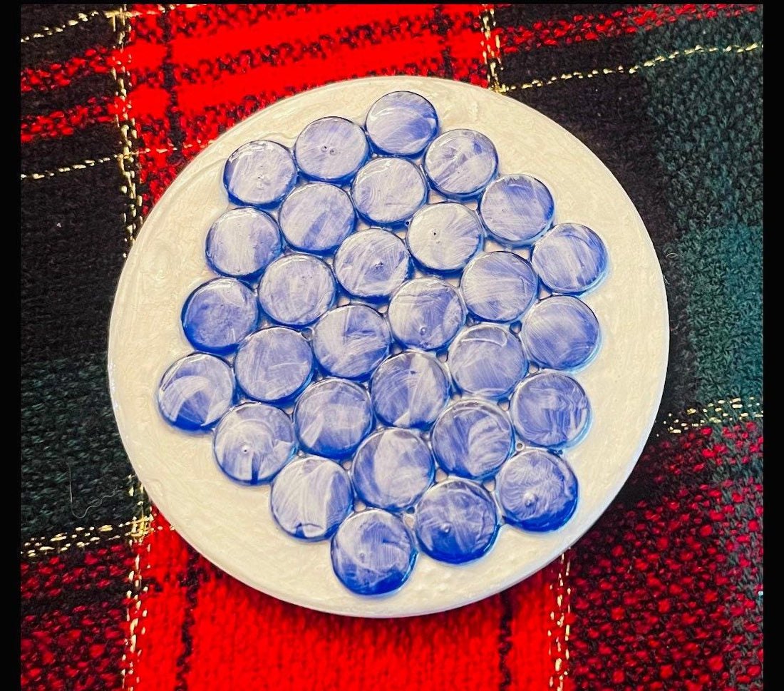 Blue marble mosaic coaster featuring artisanal craftsmanship with intricate patterning and polished finish.
