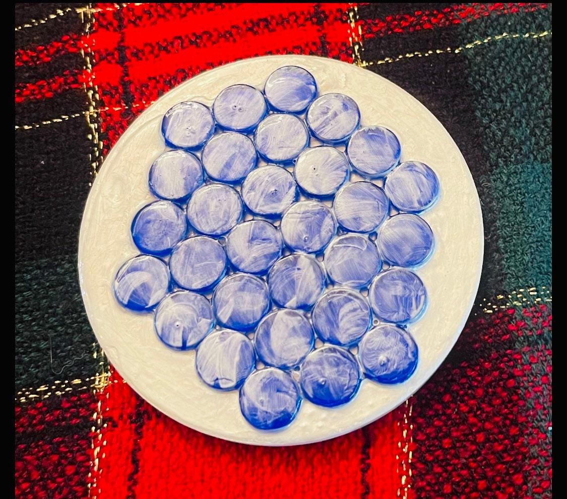 Blue marble mosaic coaster featuring artisanal craftsmanship with intricate patterning and polished finish.