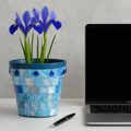 Turquoise mother of pearl flower pot with floral design, featuring a glossy finish and decorative accents.