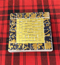 Gold and floral mosaic plant stand set by Miss Bette's Creations featuring intricate mosaic patterns and sturdy metal construction.