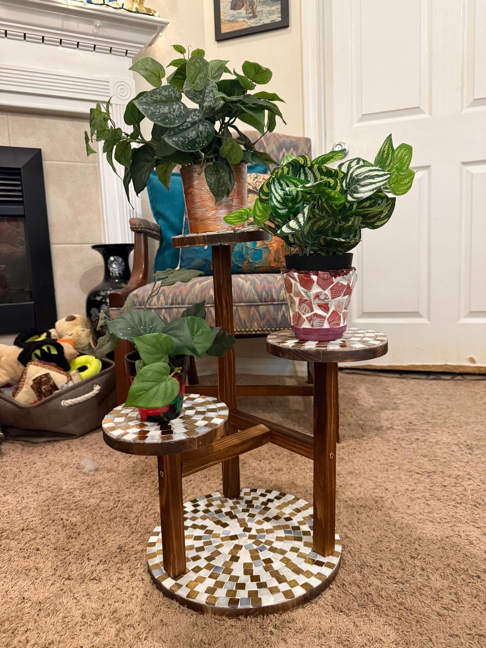 Handcrafted 3-tier mosaic plant stand with colorful ceramic tiles, perfect for displaying potted plants indoors or outdoors