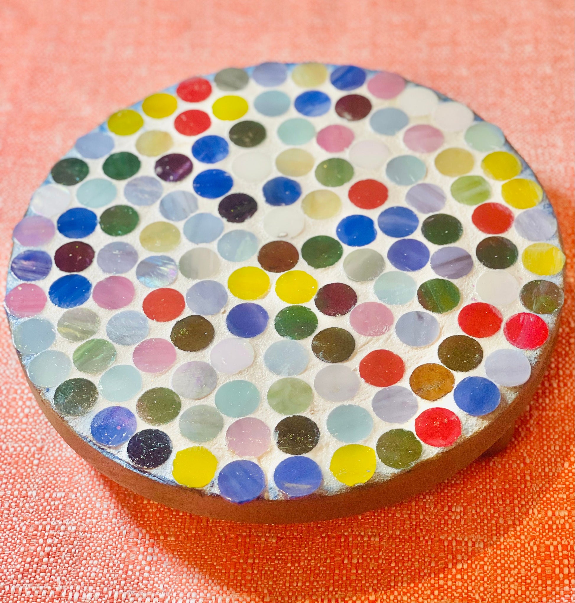 Colorful handcrafted polka dot rainbow mosaic plant stand by Miss Bette's Creations with a sturdy base and vibrant design.