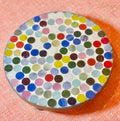 Handcrafted polka dot rainbow mosaic plant stand by Miss Bette's Creations with colorful tiled surface and sturdy wooden legs.