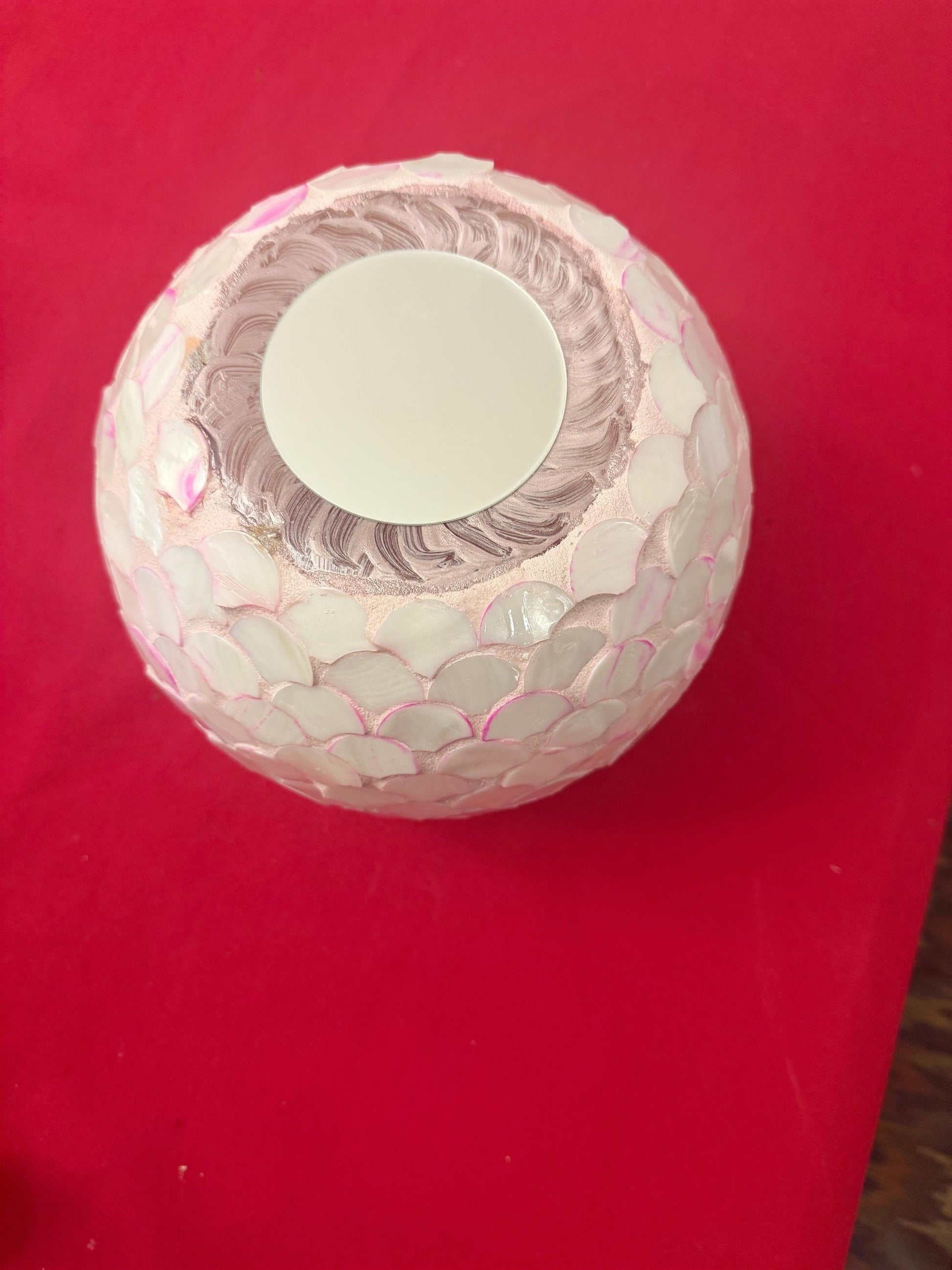 Handcrafted pink scalloped mosaic bowl with ombre design, showcasing intricate tile patterns and vibrant colors.