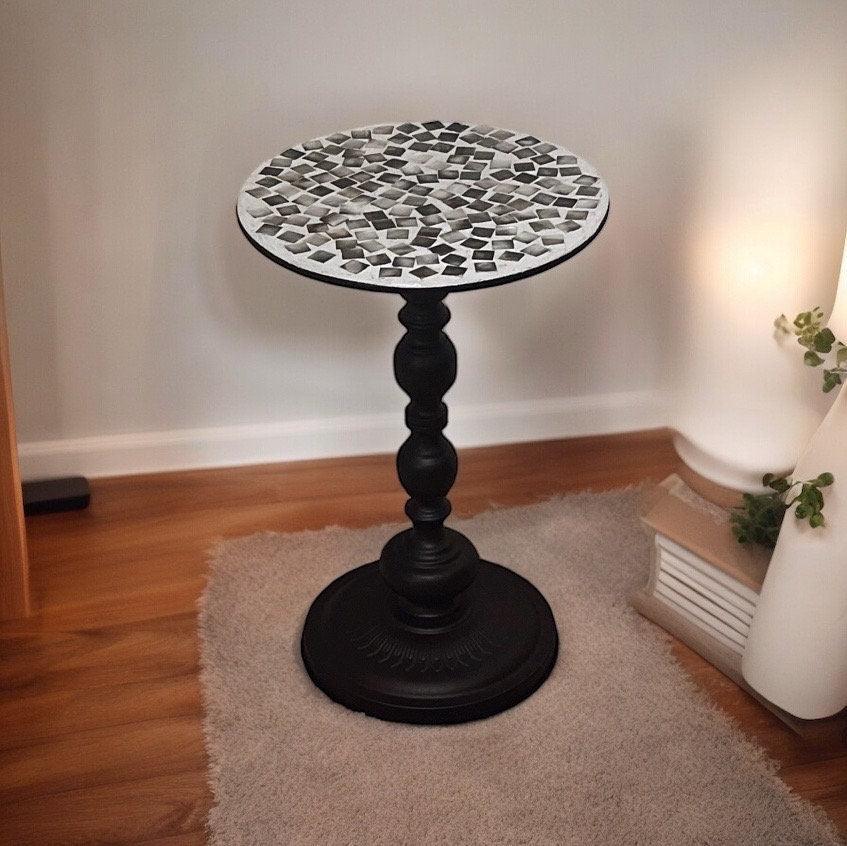 Handmade mosaic round side table with colorful tiled surface and wooden legs, designed for stylish living room or bedroom decor.