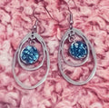 Blue mosaic drusy teardrop earrings featuring shimmering blue stone and silver hooks, elegant jewelry accessory.