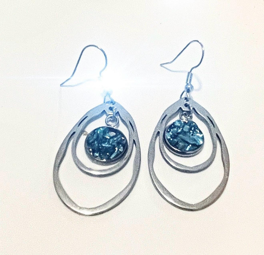 Blue mosaic drusy teardrop earrings with silver hooks, showcasing vibrant blue and textured gemstone details.