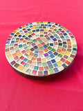 Small rainbow mosaic plant stand, handcrafted for indoor or outdoor use, featuring colorful tiled design and sturdy construction.
