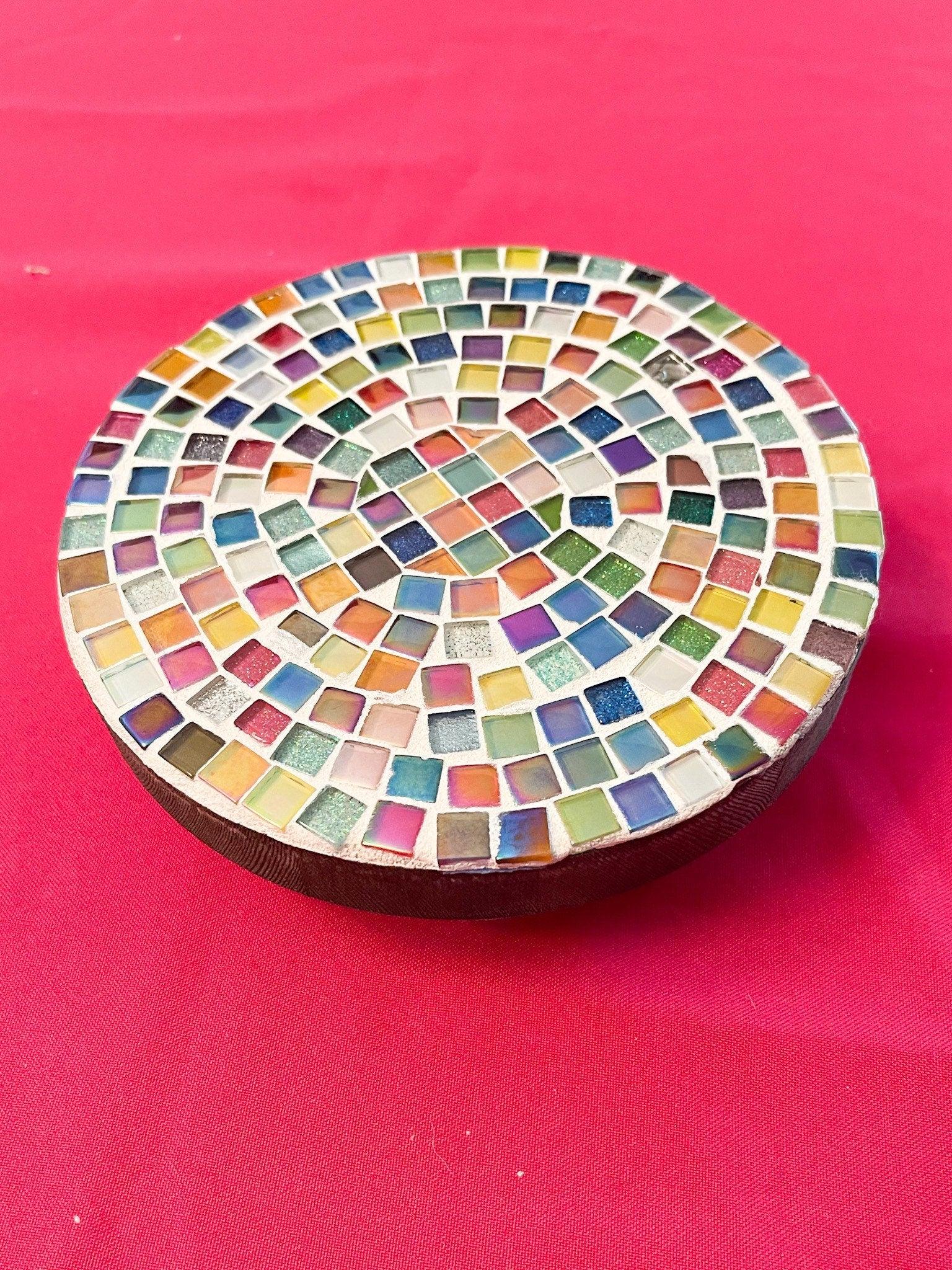 Small rainbow mosaic plant stand, handcrafted for indoor or outdoor use, featuring colorful tiled design and sturdy construction.