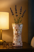 Elegant mother of pearl mosaic flower vase with floral design, showcasing shimmering mosaic tiles and a classic shape.