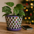 Purple and green mosaic flower pot with floral design, handcrafted ceramic planter for indoor or outdoor use