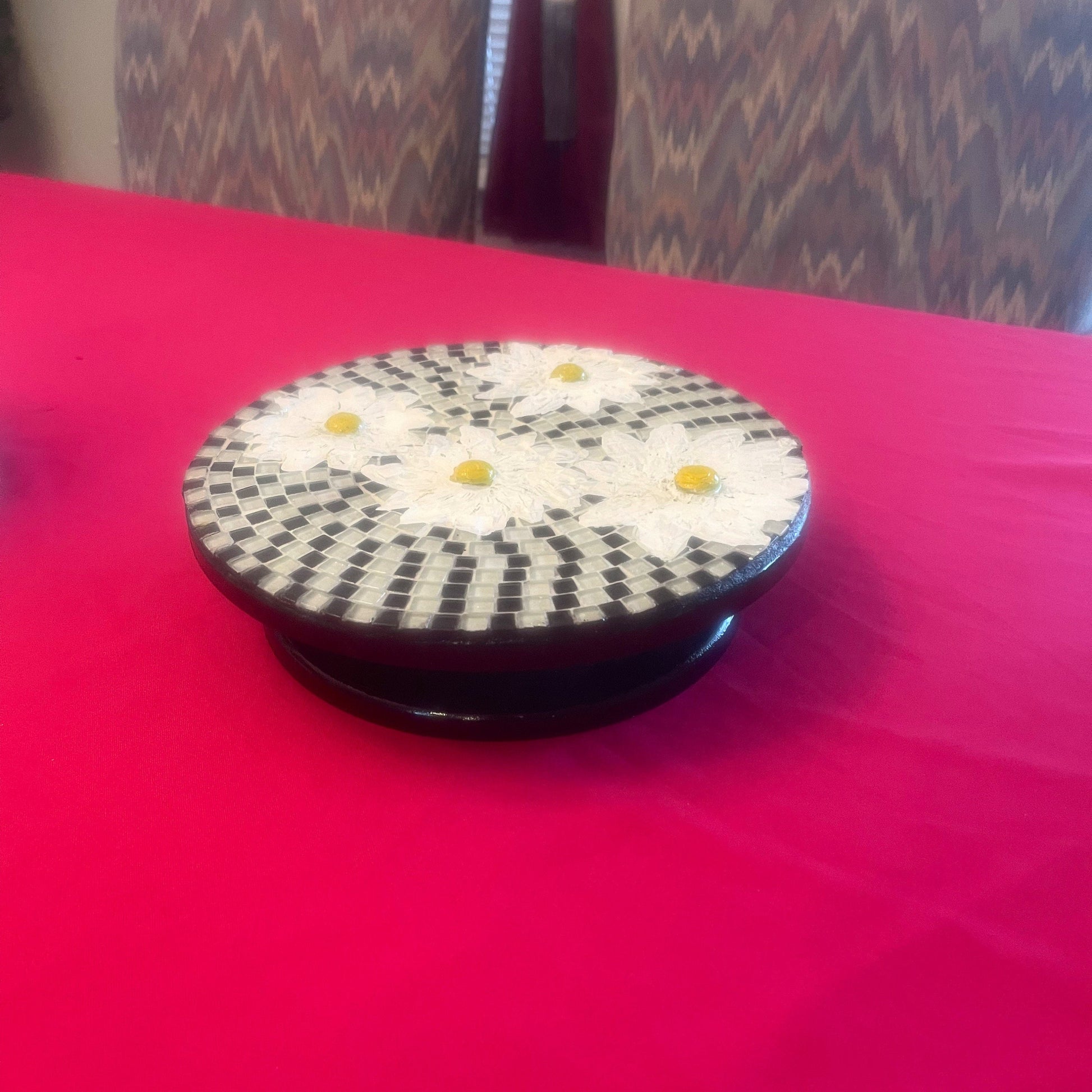 Colorful daisy floral mosaic art cake plate with intricate floral design on white ceramic, perfect for serving desserts.