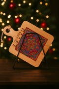 Handcrafted diamond art wood cutting board with intricate design, made from natural wood, showcasing detailed craftsmanship.