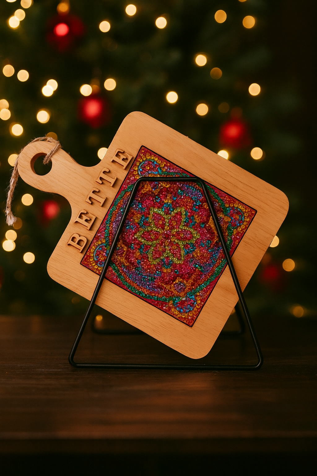 Handcrafted diamond art wood cutting board with intricate design, made from natural wood, showcasing detailed craftsmanship.