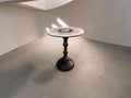 Round side table with iridescent gray and purple mosaic top on black metal base, 15-inch diameter and 20-inch tall.