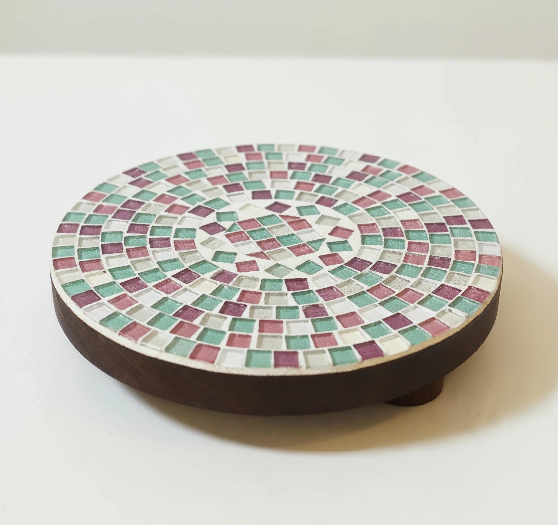 Handcrafted pink and green mosaic plant stand by Miss Bette's Creations, showcasing colorful tile patterns and sturdy design.