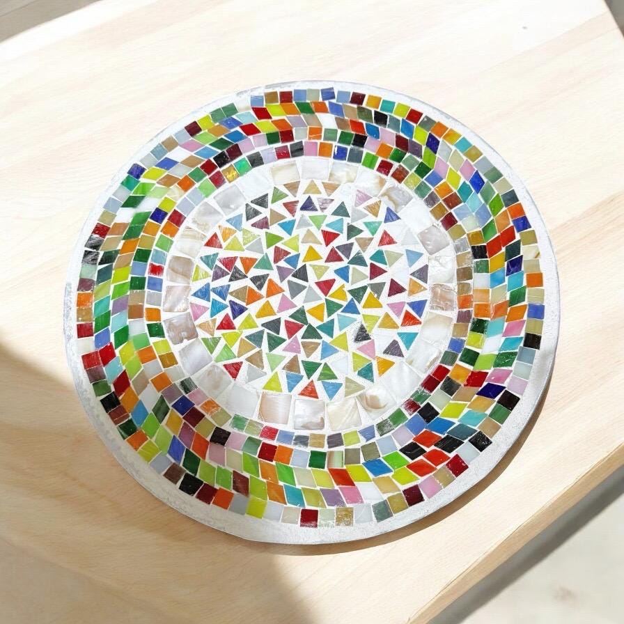 Vibrant handcrafted mosaic fruit bowl with colorful glass tiles, showcasing intricate design and artistic craftsmanship.