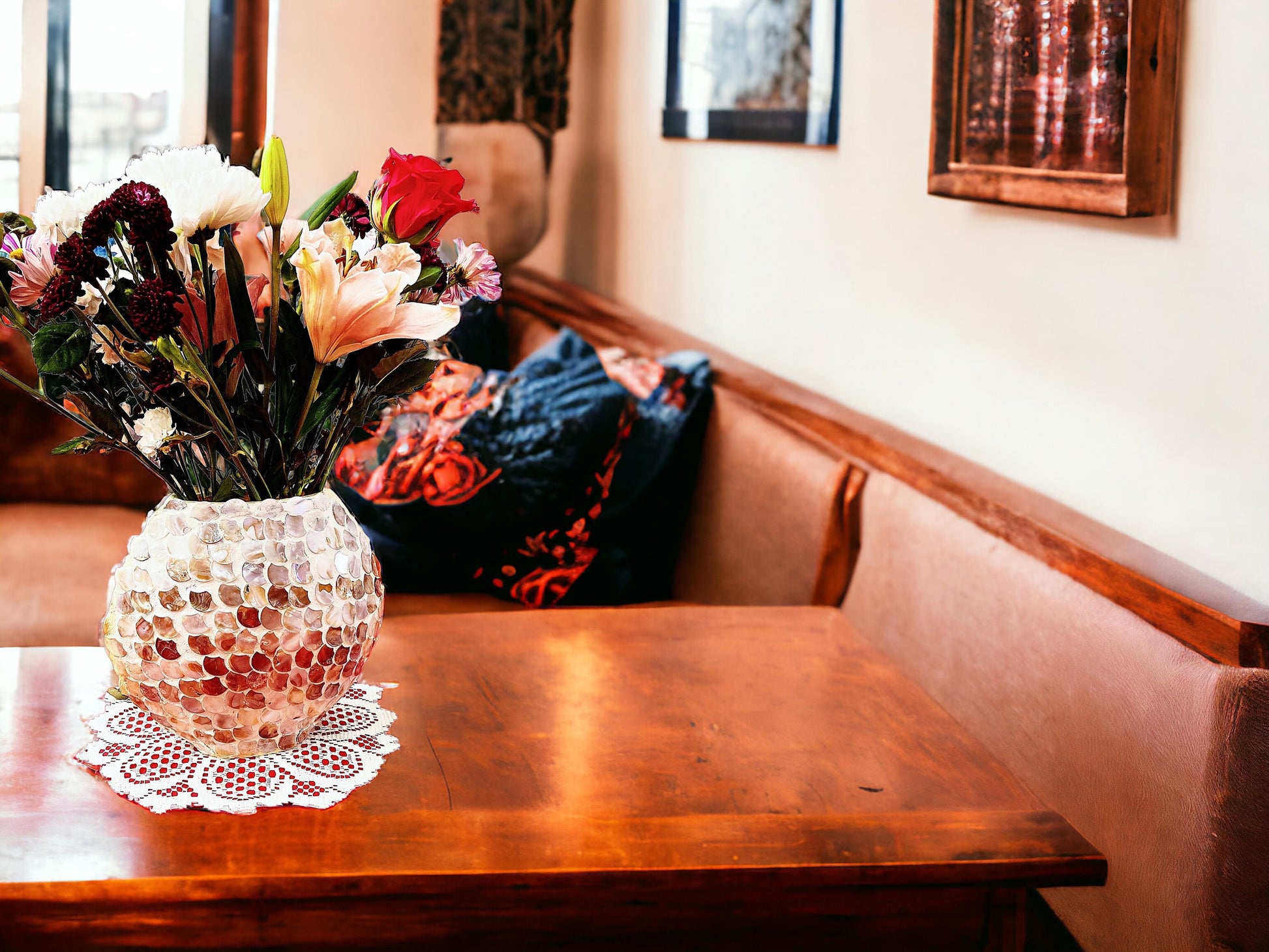 Handcrafted mother of pearl mosaic oval vase with intricate design and glossy finish, ideal for decorative floral arrangements.