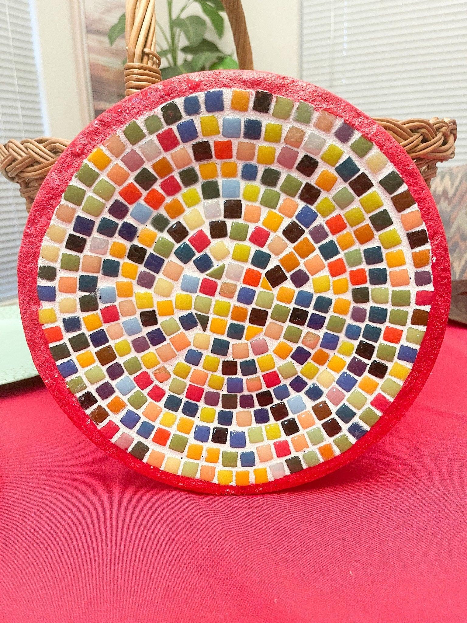 Colorful handcrafted rainbow mosaic decorative plate with intricate tile patterns, vibrant and artistic home decor piece.