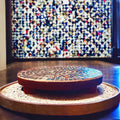 Colorful 10-inch handcrafted rainbow mosaic plant stand by Miss Bette's Creations with intricate tile patterns and sturdy metal legs.