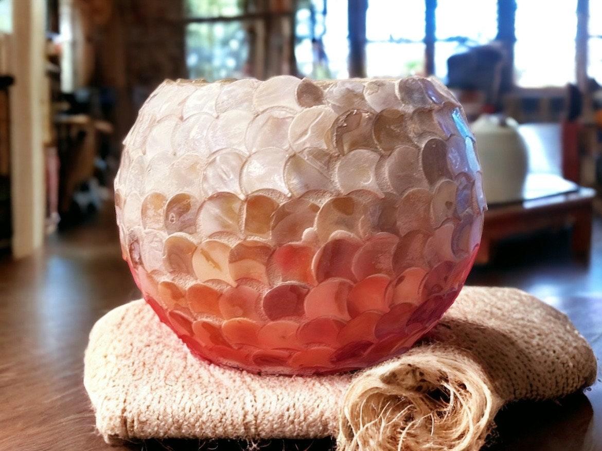 Handcrafted scalloped capiz shell globe vase with a polished, translucent surface and decorative design, perfect for elegant home decor.