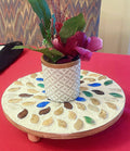 Handcrafted earth tone mosaic plant stand with multiple tiers, featuring colorful mosaic tiles and sturdy metal frame.
