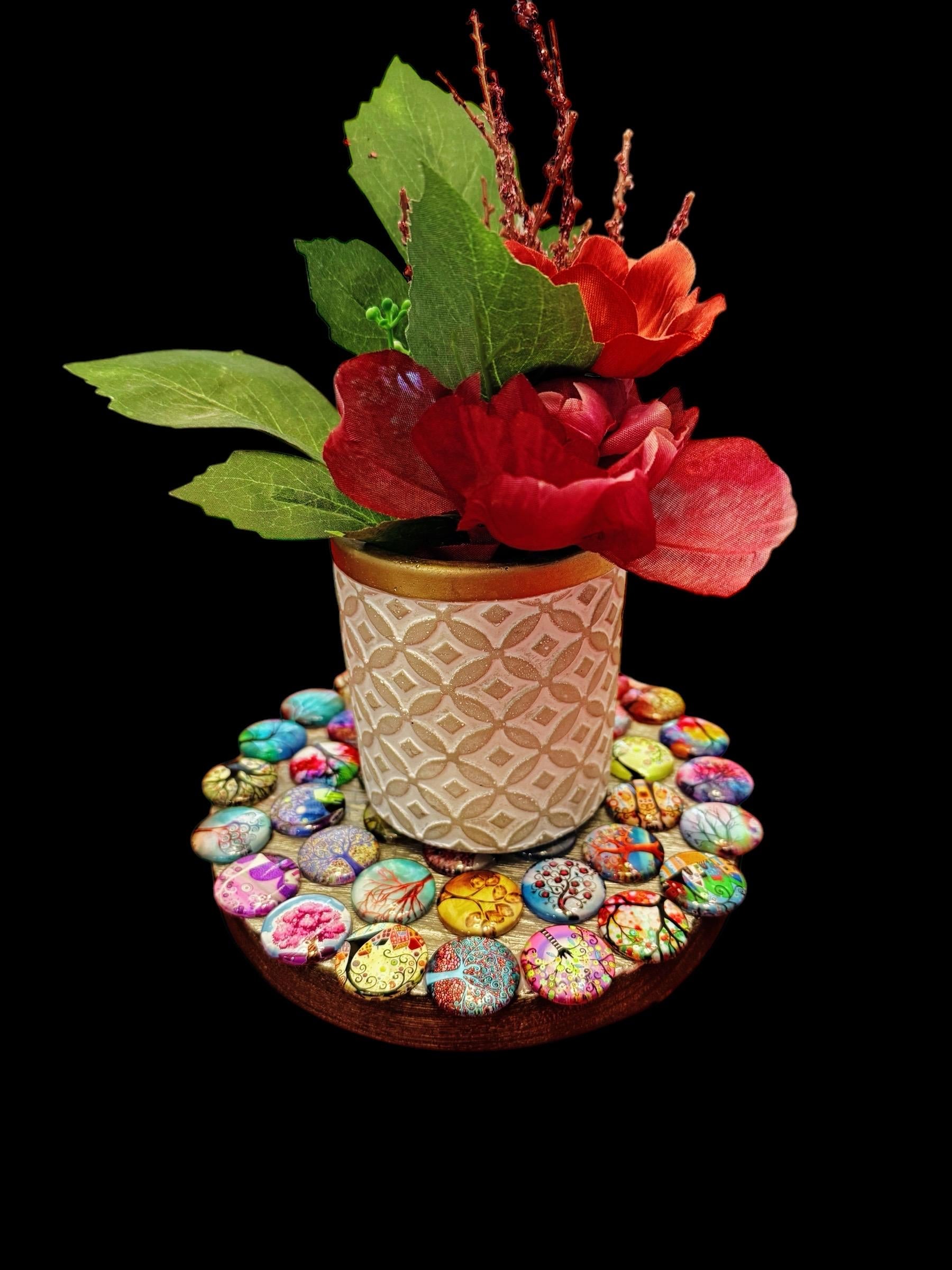 Handcrafted Tree of Life mosaic plant stand with colorful tiles, designed to hold potted plants and enhance indoor or outdoor decor.