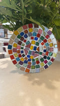 Handcrafted blue and amber mosaic plant stand with intricate tile design, ideal for displaying potted plants indoors or outdoors.