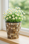 Handcrafted bronze and pearl mosaic planter with intricate design and glossy finish, perfect for indoor or outdoor decor.