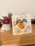 Mother of Pearl personalized photo frame with engraved design, elegant rectangular shape, and decorative border.