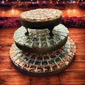 Set of handcrafted metallic mosaic plant stands with intricate patterns, perfect for showcasing indoor or outdoor plants.