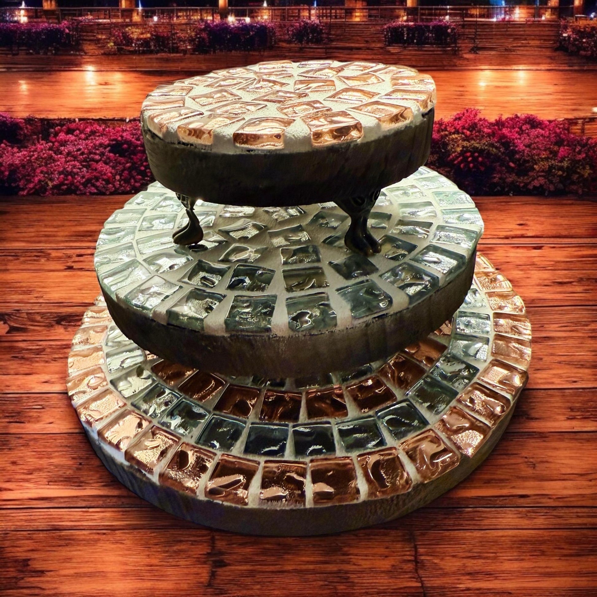 Set of handcrafted metallic mosaic plant stands with intricate patterns, perfect for showcasing indoor or outdoor plants.