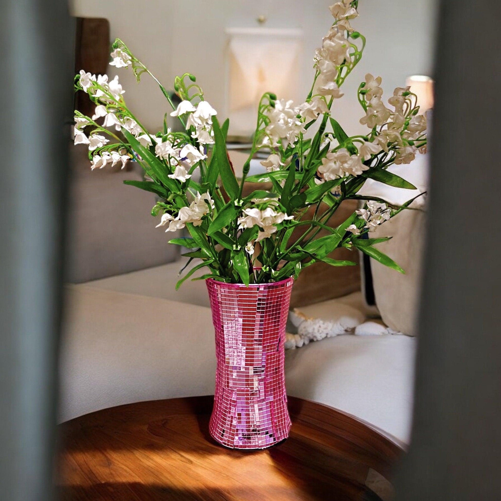 Handcrafted pink disco ball mirror vase with reflective surface and decorative design, perfect for stylish home decor.