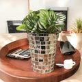 Artificial snake plant in silver mosaic planter, featuring green foliage and decorative ceramic design from Miss Bette's Creations.