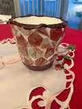Handcrafted broken china mosaic flower pot with colorful floral design, showcasing intricate mosaic pattern and vibrant craftsmanship.