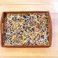 Artisan teal mosaic round box with intricate patterns and a smooth finish, perfect for decorative storage or jewelry.