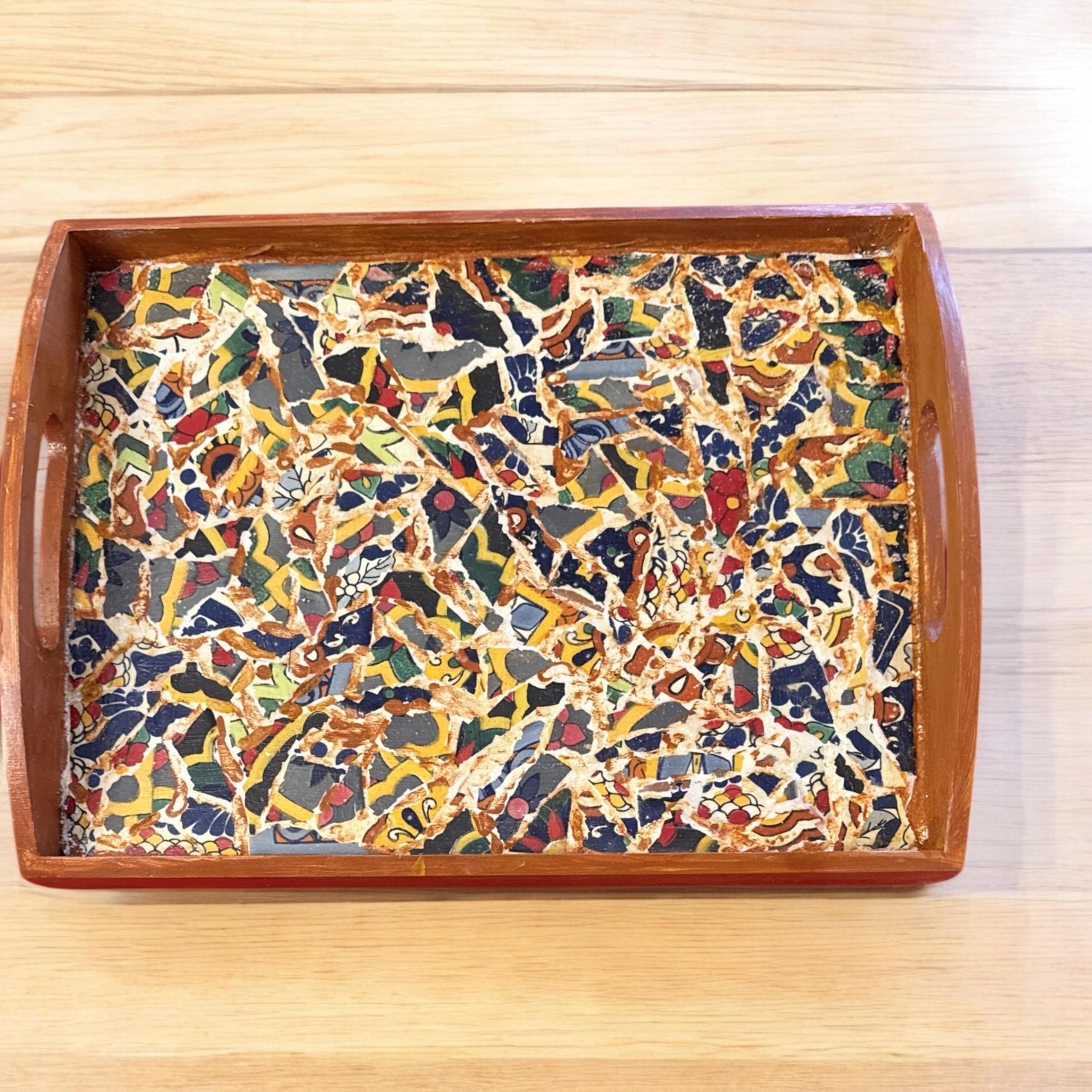 Artisan teal mosaic round box with intricate patterns and a smooth finish, perfect for decorative storage or jewelry.
